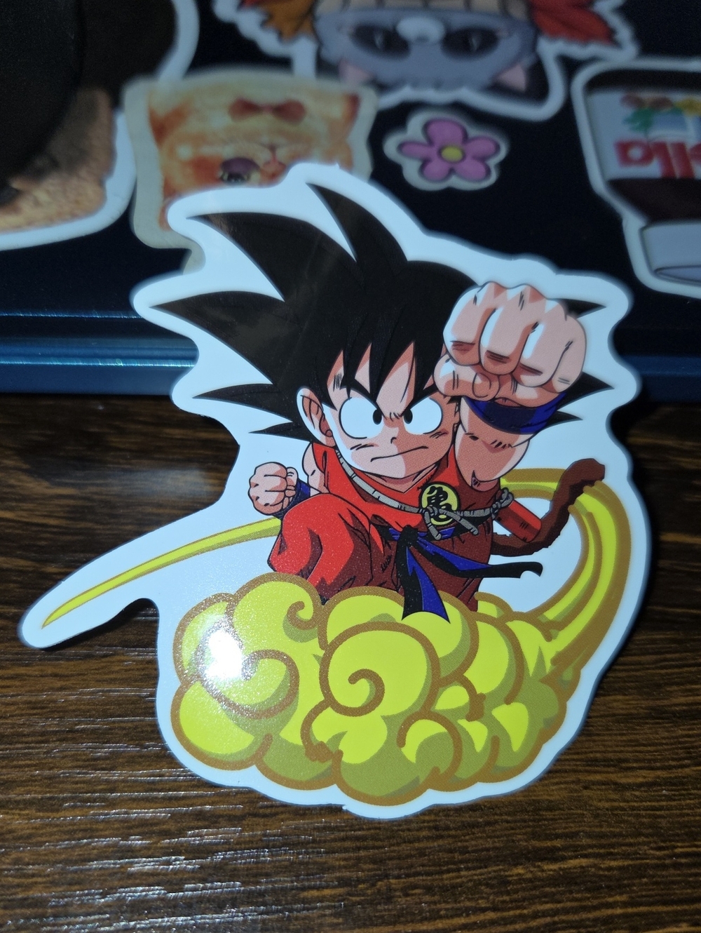Red Martial Hero Sticker on Yellow Cloud – Licensed Anime Character